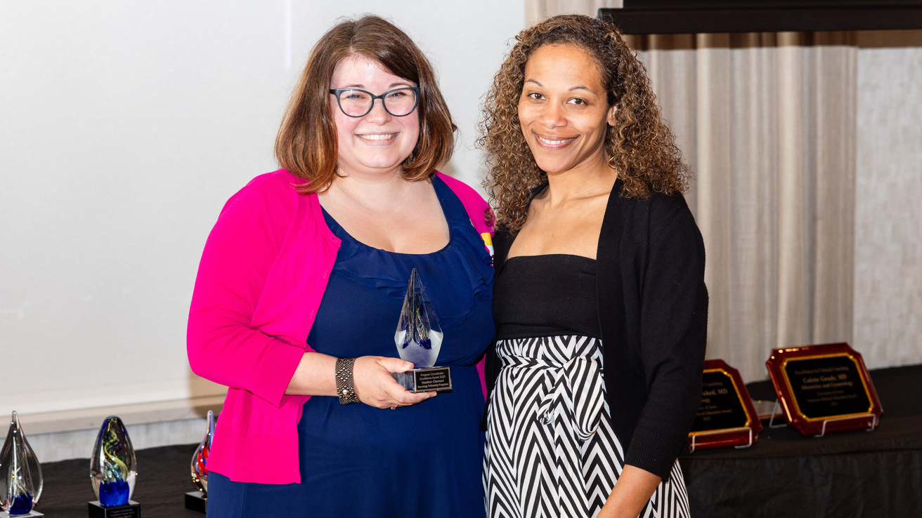 Briana Horwath presents Heather Clement (Neurology) with her 2025 Program Coordinator Award.